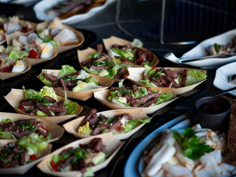 Catering,Assortment,Of,Gourmet,Appetizers,On,Dark,Serving,Plates,,Fresh